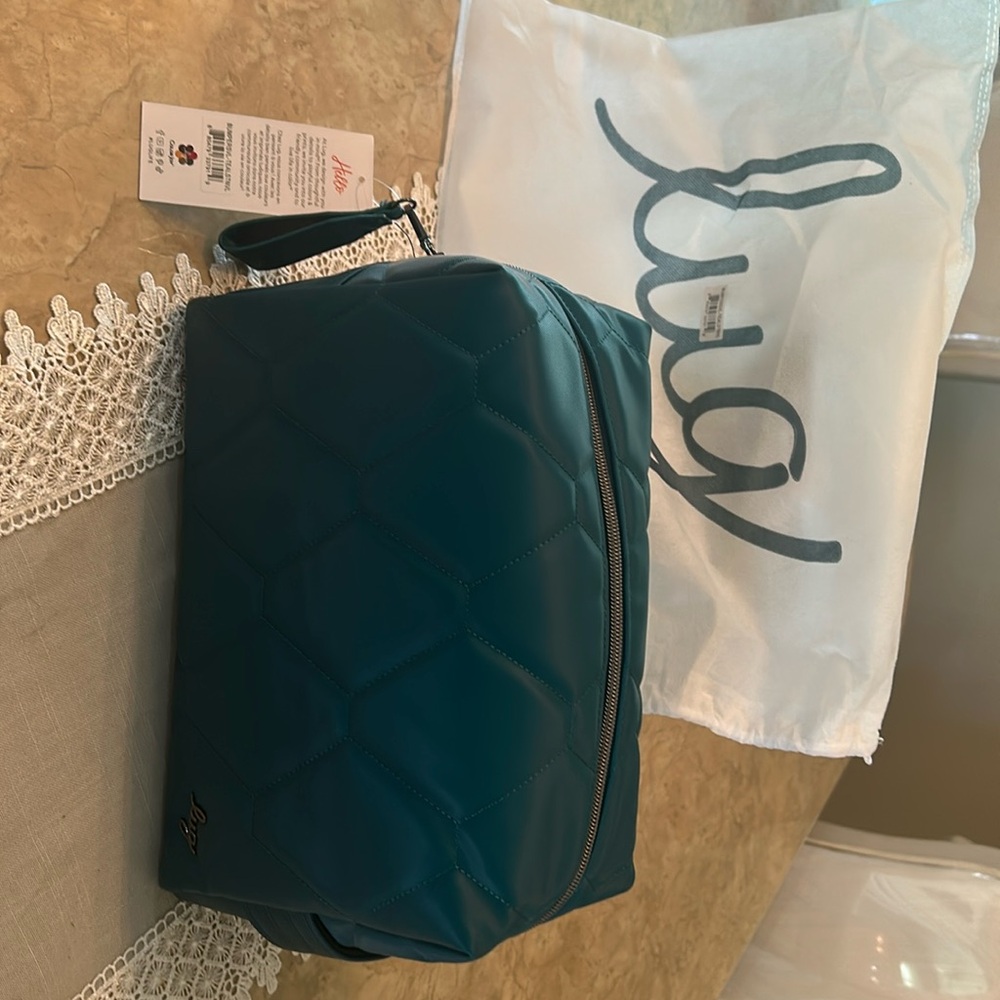 NWT Lug Vegan Satin Luxe Teal Bumper